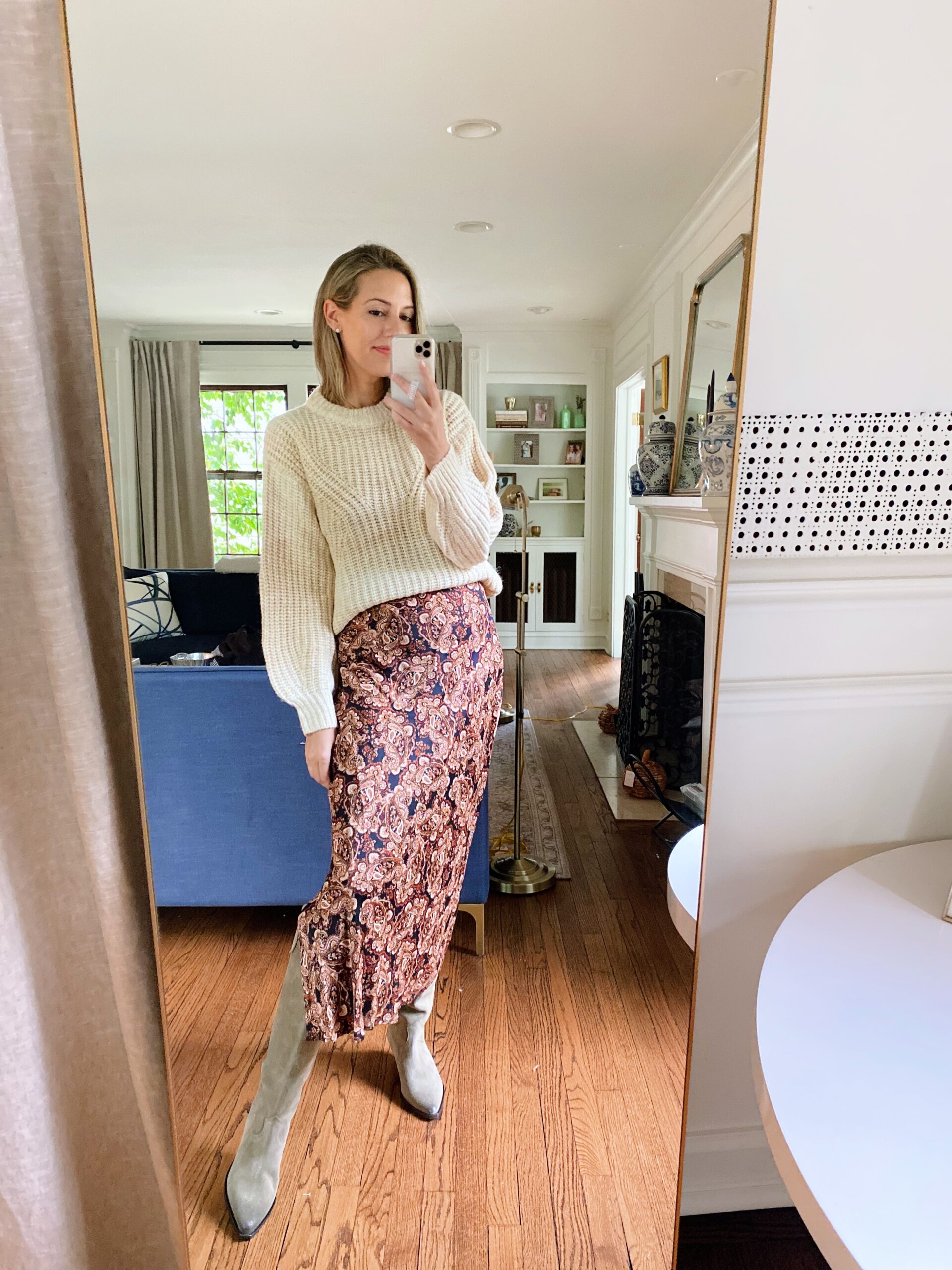 woman in New Day sweater + Nili Lotan dress