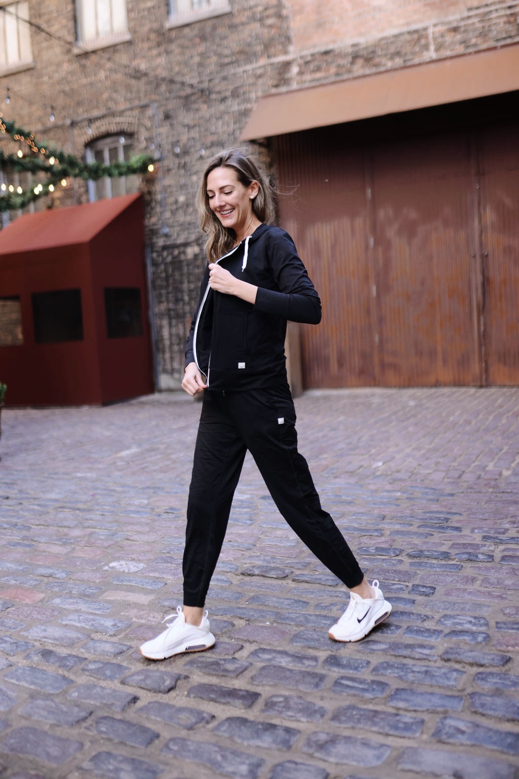 woman walking and wearing sportswear woman walking and wearing sportswear