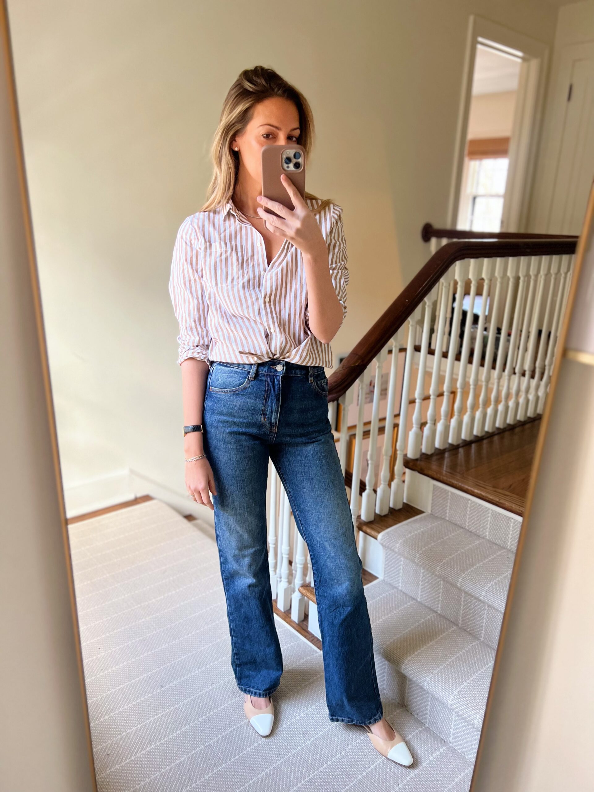 woman wearing January Refresh with Sézane striped button down and pants woman wearing January Refresh with Sézane striped button down and pants